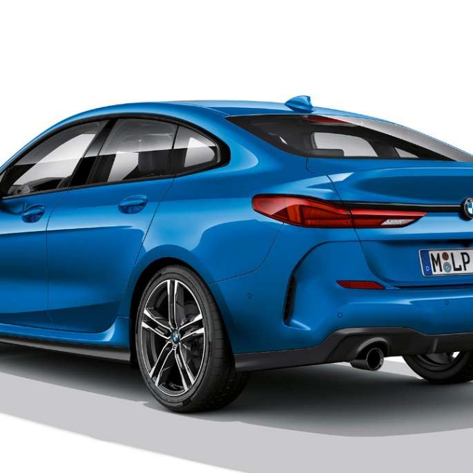 BMW Individual high-gloss Shadow Line BMW 2 Series Gran Coupé Model M Sport BMW Individual high-gloss Shadow Line BMW 2 Series Gran Coupé Model M Sport Misano Blue metallic F44 three-quarter side view