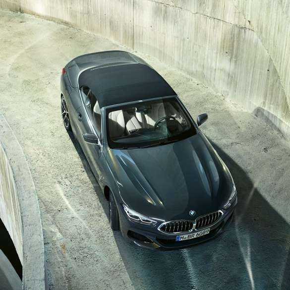 BMW M850i xDrive Dravit Grey metallic with soft top in black, bird’s-eye view. BMW M850i xDrive Dravit Grey metallic with soft top in black, bird’s-eye view.