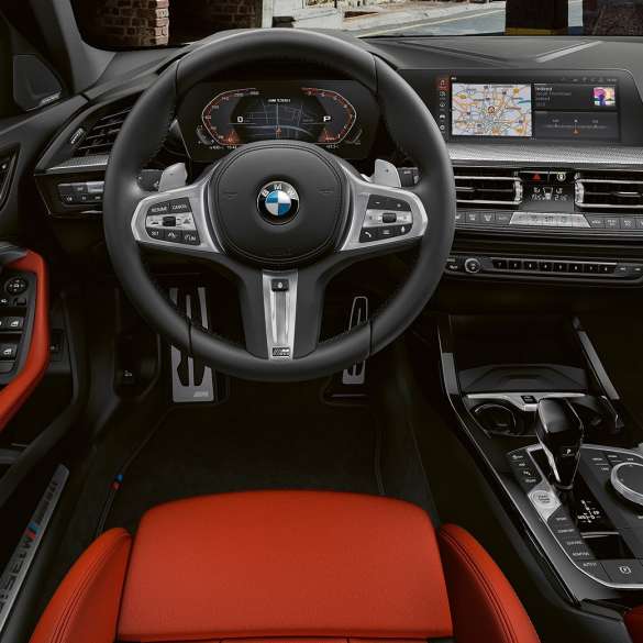 BMW M135i xDrive, interior. BMW M135i xDrive interior with M Leather steering wheel and M Sport seats.