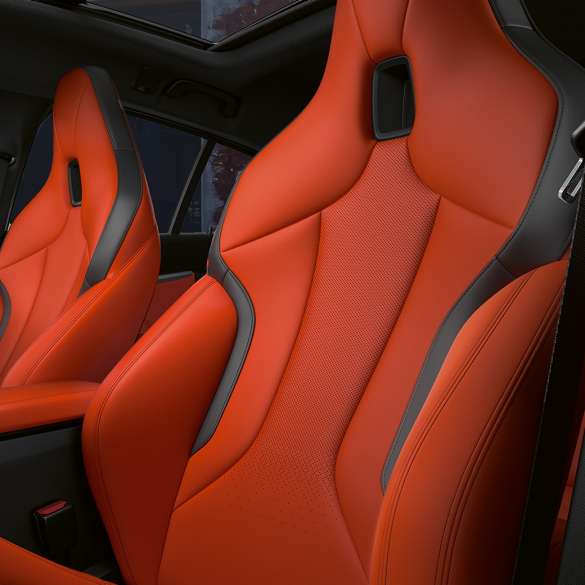 M Sport seats with integrated headrest. Athletic M Sport seats with integrated headrest in the interior of the BMW M135i xDrive.
