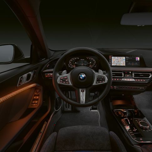 BMW M135i xDrive, cockpit. BMW M135i xDrive premium interior with illuminated interior trim finishers.
