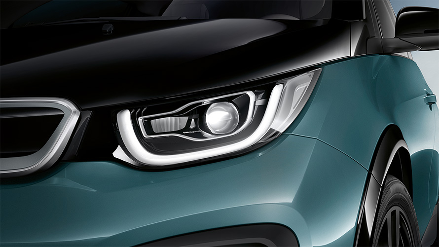BMW i3 I01 2018 Blue Ridge Mountain with Frozen Grey metallic highlight close-up front LED headlights