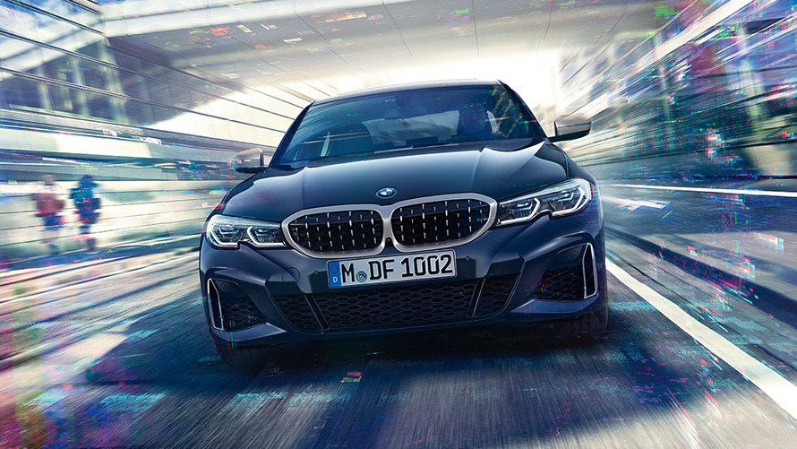 BMW M340i xDrive Sedan G20 2020 Sapphire Black metallic front view in motion