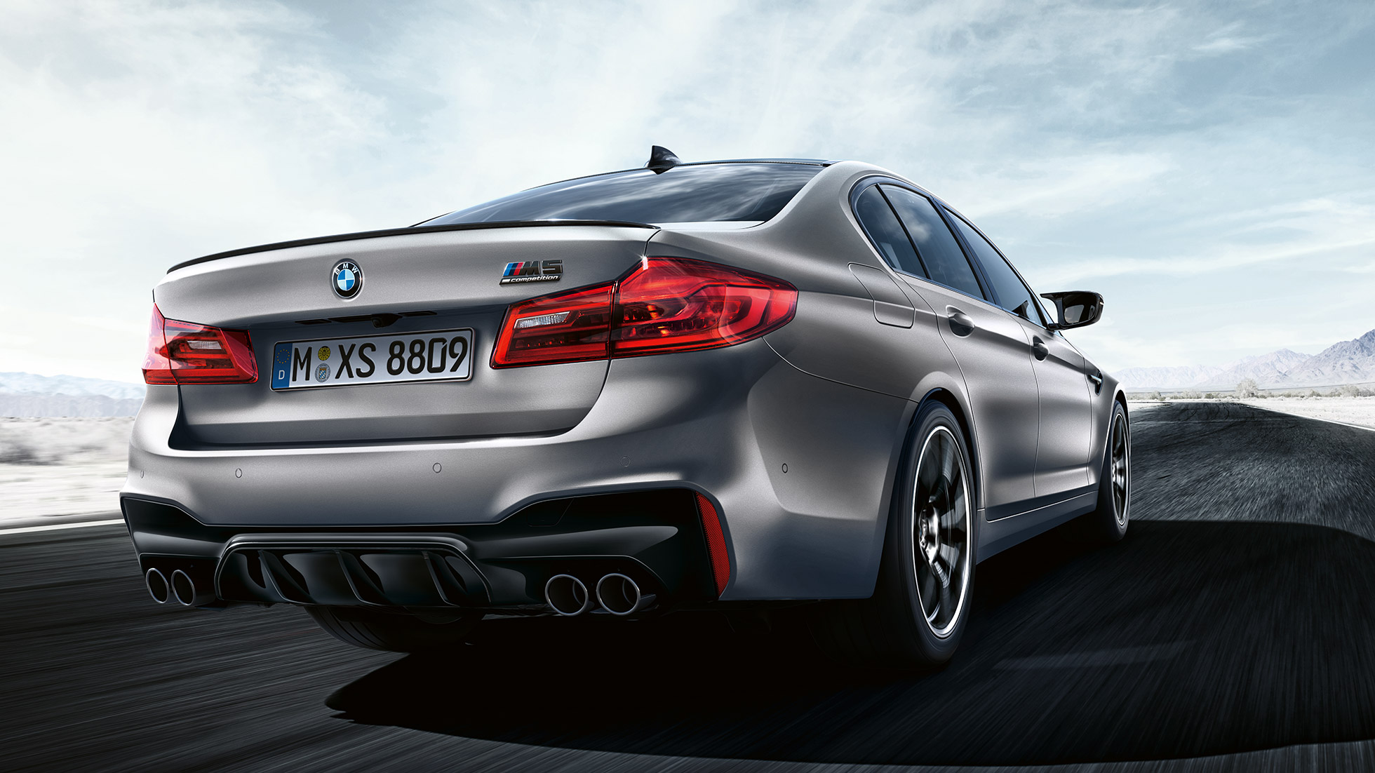 LED rear lights. BMW M5 Competition three-quarter rear shot design.