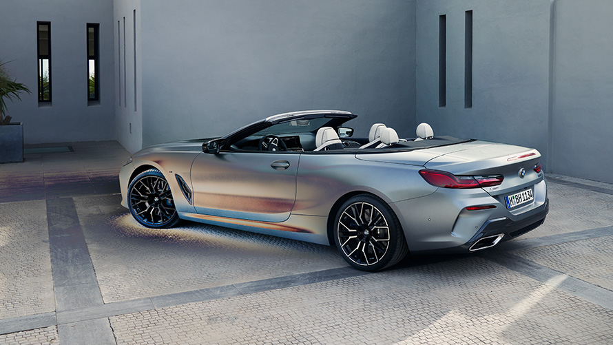 Three-quarter rear view BMW 8 Series Convertible 2022 G14 LCI Facelift BMW Individual Frozen Pure Grey metallic BMW 8 Series Convertible 2022 G14 LCI Facelift BMW Individual Frozen Pure Grey metallic three-quarter rear view