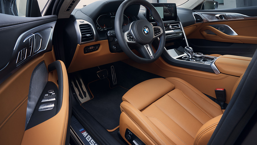 BMW M850i xDrive Gran Coupé G16 LCI Facelift 2022 Interior cockpit through open driver's door